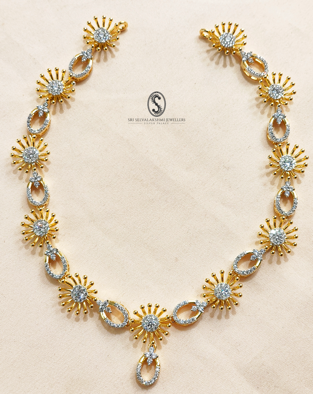 Gold coated silver necklace with diamond inspired accents