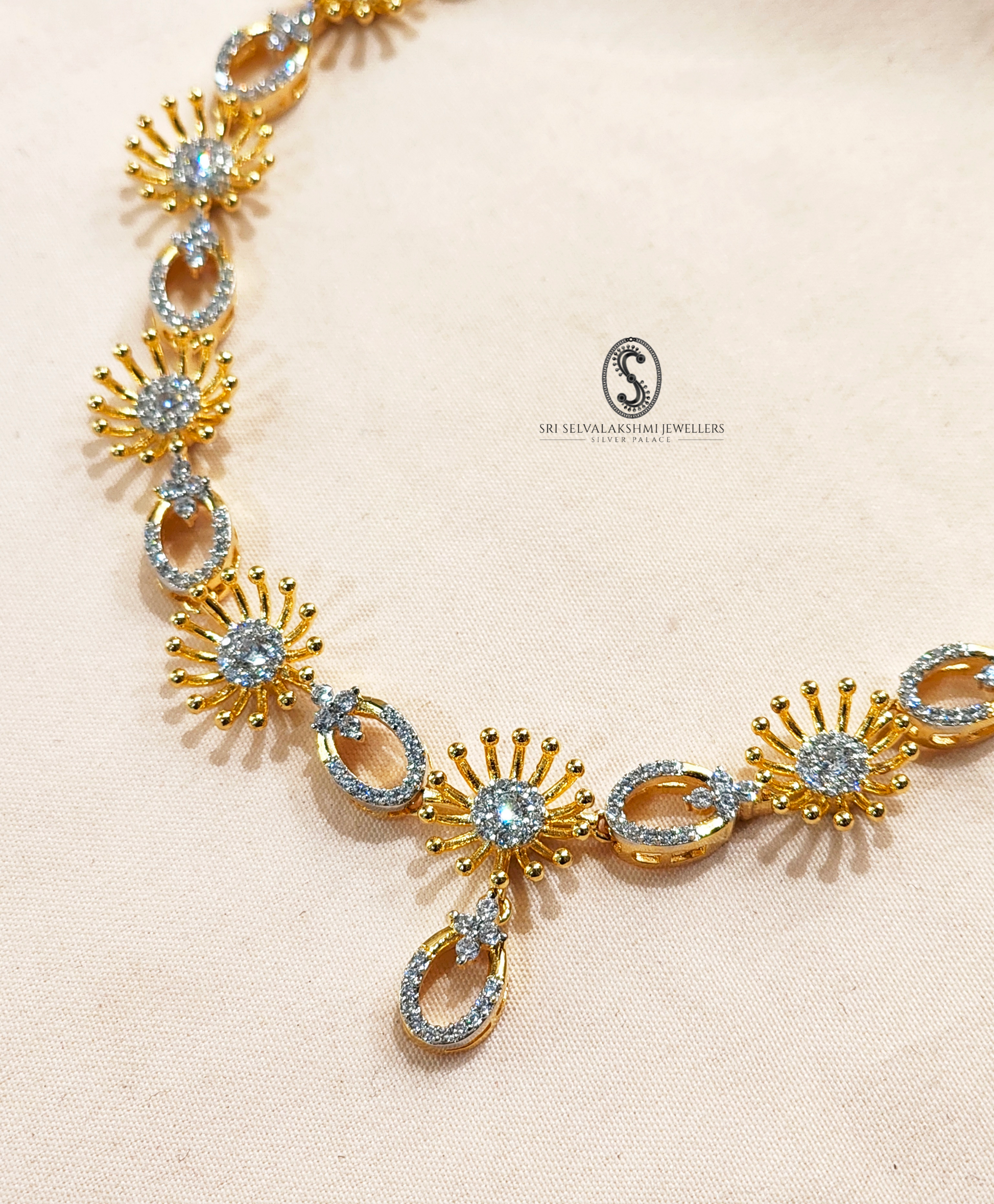 Gold coated silver necklace with diamond accents